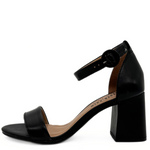 Black sandal with block heel on a white background
