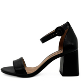 Black sandal with block heel on a white background