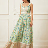 Woman wearing a floral summer sundress with a unicorn print