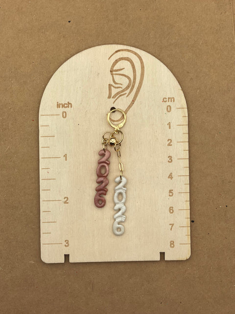 Jump Into 2026 Sparkly Rose Gold Earrings