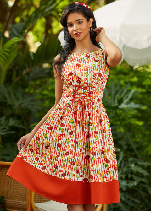 1950s style dress with bold red border featuring lobster and lemon print detail