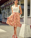 High-waisted pleated A-line skirt with button front and coastal print, front view