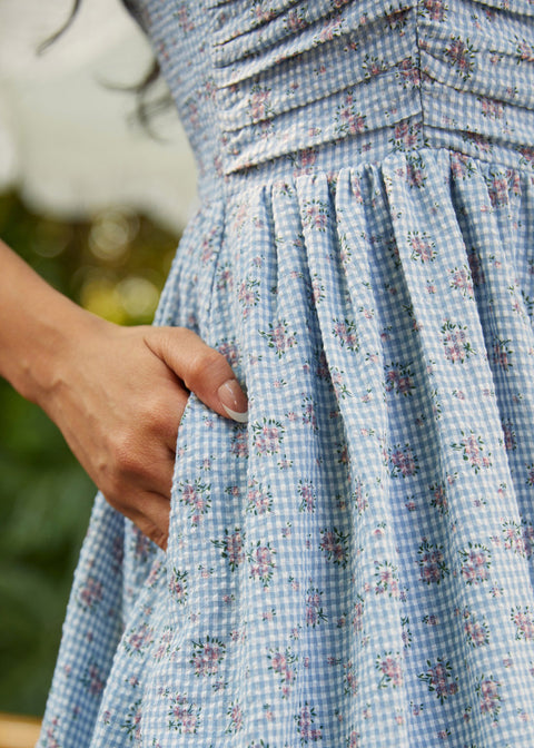 Floral gingham fit and flare sundress with side pocket detail and softly gathered skirt