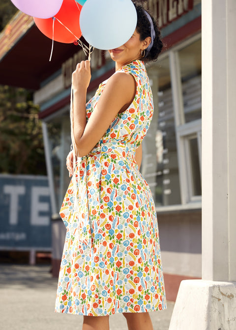 Side view of a colorful cotton shirt dress with a flattering fit-and-flare silhouette for everyday wear.