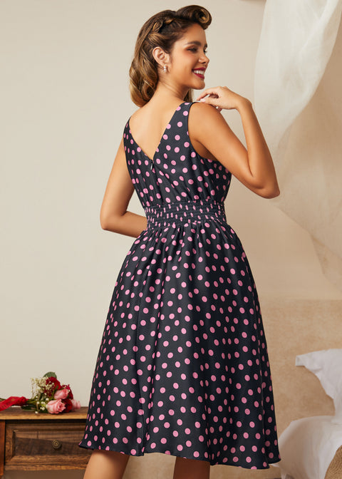 Back view showing smocked waistband and zipper detail on midi dress