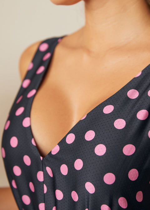Close-up of V-neckline and textured woven fabric