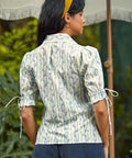 Back view of the Dear Diary Blouse in Blue Willow showing the relaxed fit and lightweight woven cotton fabric.