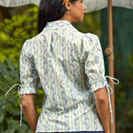 Back view of the Dear Diary Blouse in Blue Willow showing the relaxed fit and lightweight woven cotton fabric.