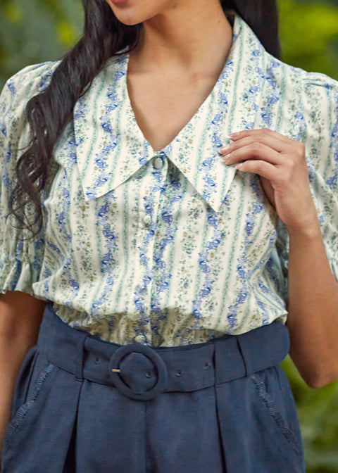 Close-up of the oversized pointed collar and covered button placket on the Dear Diary Blouse in Blue Willow.