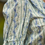 Detail of the adjustable tie cuff and softly gathered puff sleeve on the Dear Diary Blouse in Blue Willow.