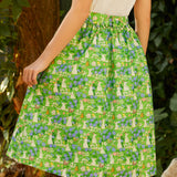 Back view of The Garden Stroll Skirt in Hide & Squeak showcasing the gathered waist, removable self-tie sash, and whimsical mouse and floral print.