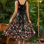 square neck fit and flare party dress with corset lace up back and gored a line skirt back view
