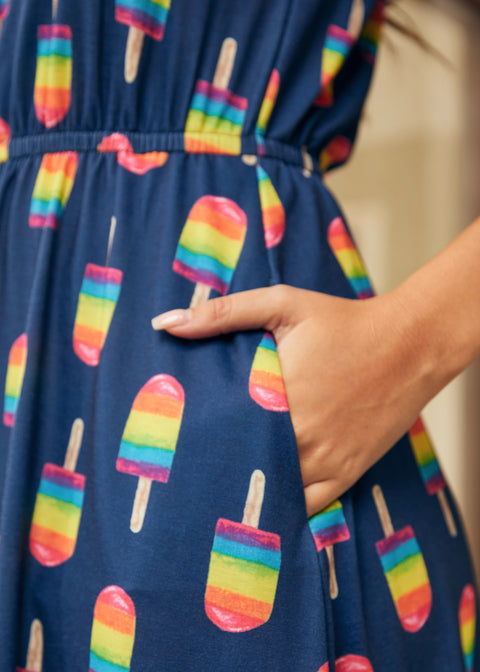 Detail of elastic waist and side pocket on printed dress