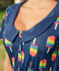 Close-up of collar and button-front dress detail with rainbow popsicle pattern
