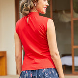 Back view of red mock neck top with keyhole closure