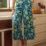 Wide leg cropped palazzo pants in fruit print with elastic waistband, front view