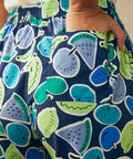 Close-up of fruit print palazzo pants with back patch pocket