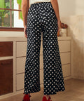 Back view of wide leg palazzo pants with elastic waistband and relaxed fit