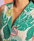 Close-up of collared neckline and tropical citrus print fabric on cotton dress