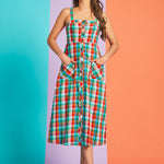 Full-length view of vintage-inspired rainbow plaid sundress