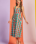 Woman wearing multicolor plaid cotton midi dress with button-front closure