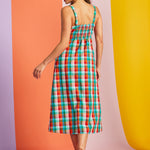 Back view of rainbow plaid midi dress with stretchy smocked back panel