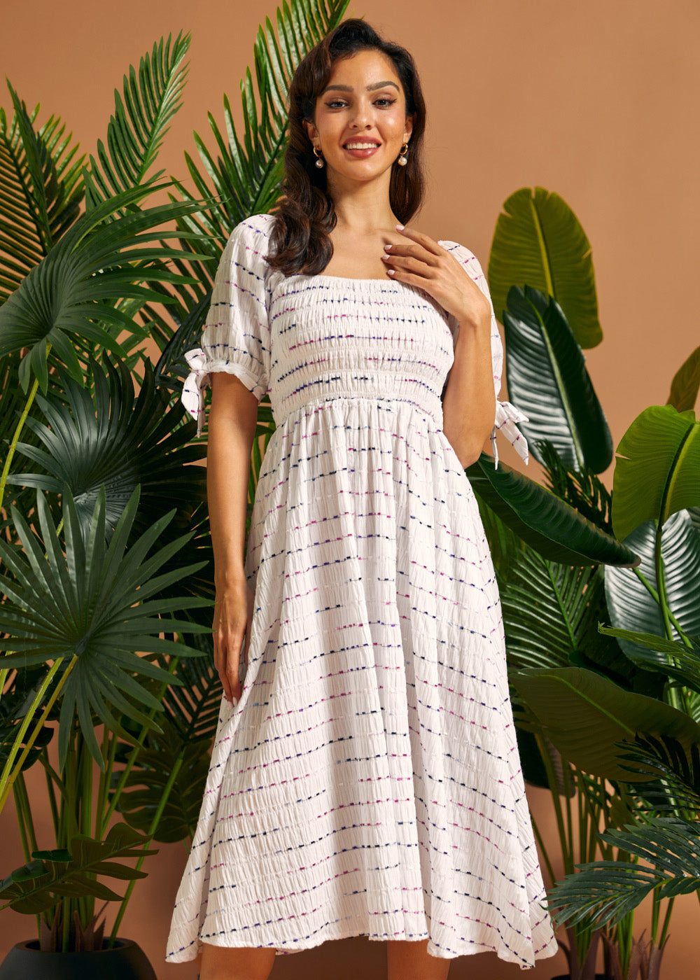 Woman wearing a vintage-inspired smocked midi dress with puff sleeves and side pockets.