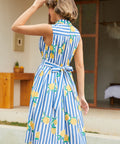 Back view of a sleeveless striped lemon dress with attached self-tie belt.