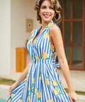 Side view of a vintage-inspired striped lemon dress with a full button front.