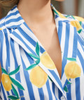 Close-up of the notched collar and V-neckline on the Lemon Stripe dress.