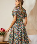 Back view of the midnight floral fit-and-flare dress with a removable belt.