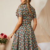 Back view of the midnight floral fit-and-flare dress with a removable belt.
