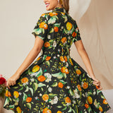 Back view of a vintage-inspired citrus print cotton fit-and-flare dress.