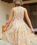 Back view of a sleeveless vintage-inspired cotton dress with a back zipper and full fit-and-flare skirt.