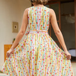 Back view of a sleeveless vintage-inspired cotton dress with a back zipper and full fit-and-flare skirt.