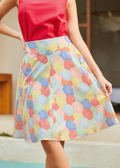 Woman wearing a 1950's inspired colorful patterned skirt