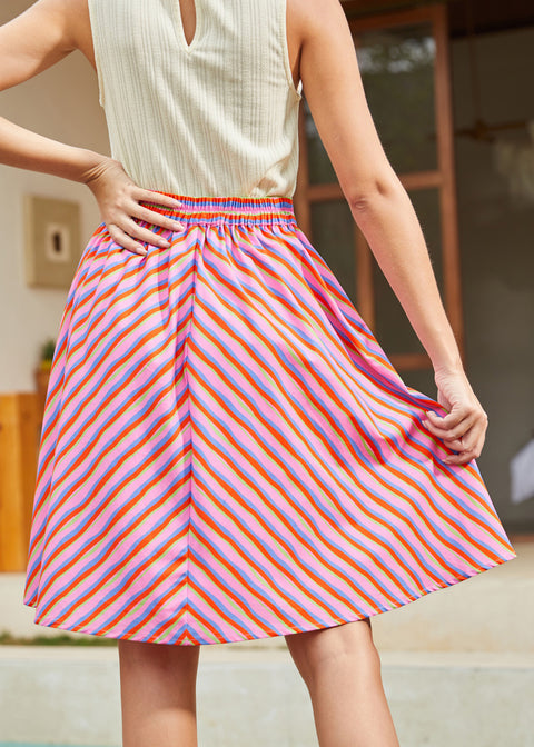 Back view of pink striped skirt with elastic waistband and chevron stripe pattern