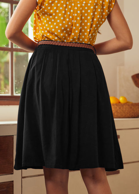 Back view of black vintage-inspired gathered skirt with braided belt
