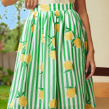 Close-up of gathered waist skirt with lemon print and stripe pattern
