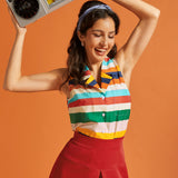 Woman wearing a relaxed-fit striped sleeveless blouse with vintage-inspired styling.