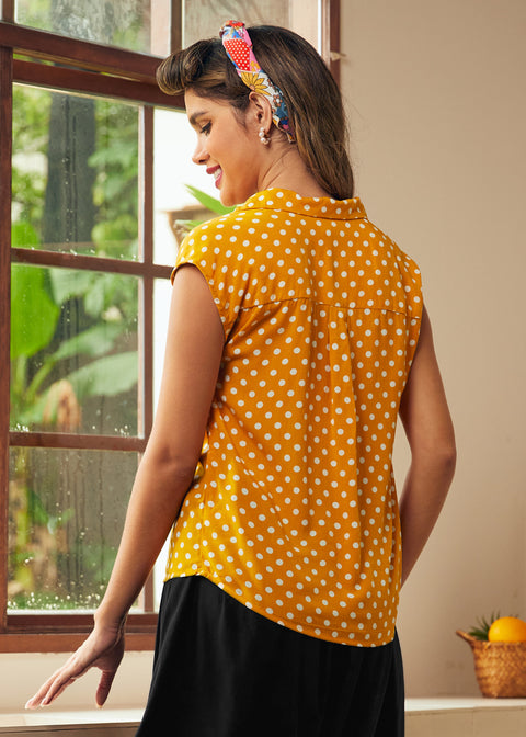 Back view of yellow polka dot cap sleeve blouse