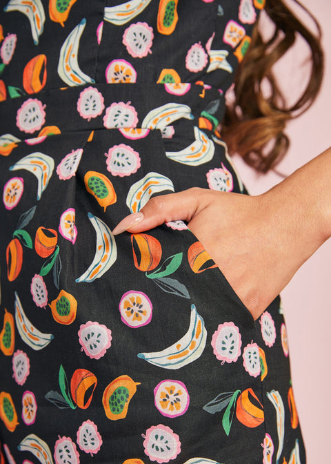 Close-up of colorful fruit print fabric with side pocket detail