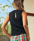 Back view of black sleeveless ribbed top with keyhole button closure