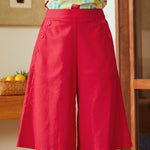 Red linen blend skort with A-line silhouette and knee-length hem shown front view