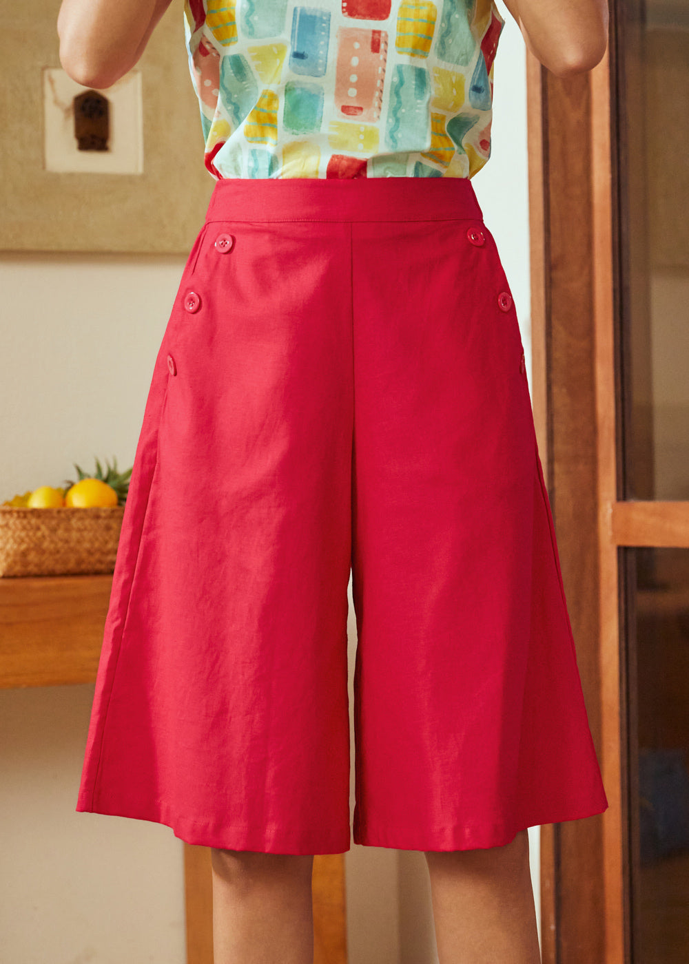 Red linen blend skort with A-line silhouette and knee-length hem shown front view