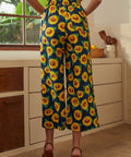Back view of sunflower palazzo pants with elastic waistband and wide-leg silhouette