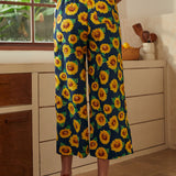 Back view of sunflower palazzo pants with elastic waistband and wide-leg silhouette