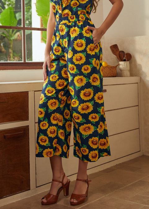 Navy wide-leg palazzo pants with sunflower print styled with matching sleeveless top front view