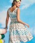 Back view of sleeveless fit-and-flare dress with smocked back panel