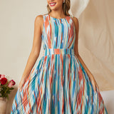 Woman wearing colorful striped midi dress with vintage-inspired silhouette